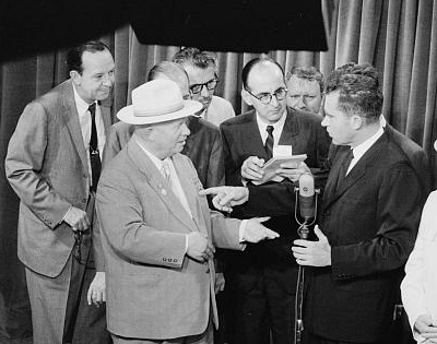 A black and white photograph taken during the famous "Kitchen Debate" between Soviet Premier Nikita Krushchev and American Vice President Richard M. Nixon. The original recording of this historical event has disappeared, and has possibly been recorded over.